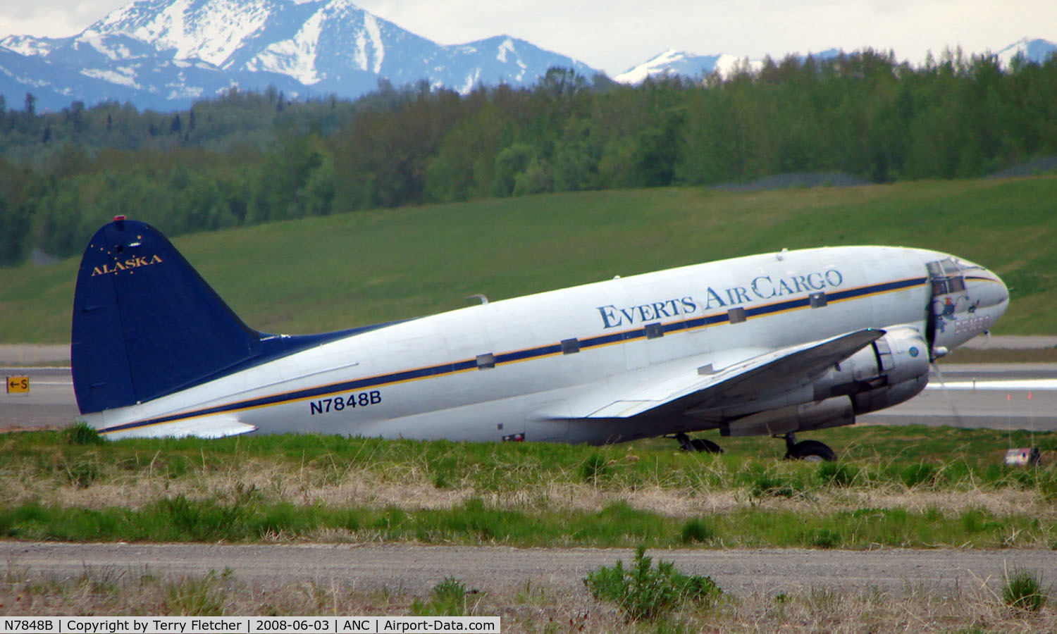 N7848B, 1942 Curtiss C-46R Commando C/N 273, 66 years old - and still flying  , Everts C-46 awaits clearance to take off from Anchorage Int