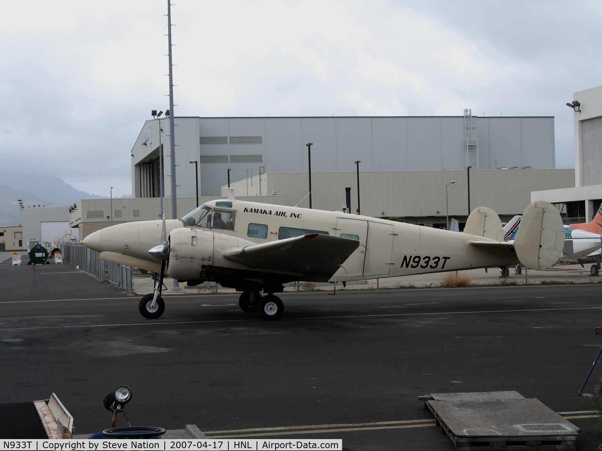 N933T, 1964 Beech H-18 Tri-Gear C/N BA-665, Kamaka Air Inc (cargo) 1964 Beech H-18 starting engines @ Honolulu, HI