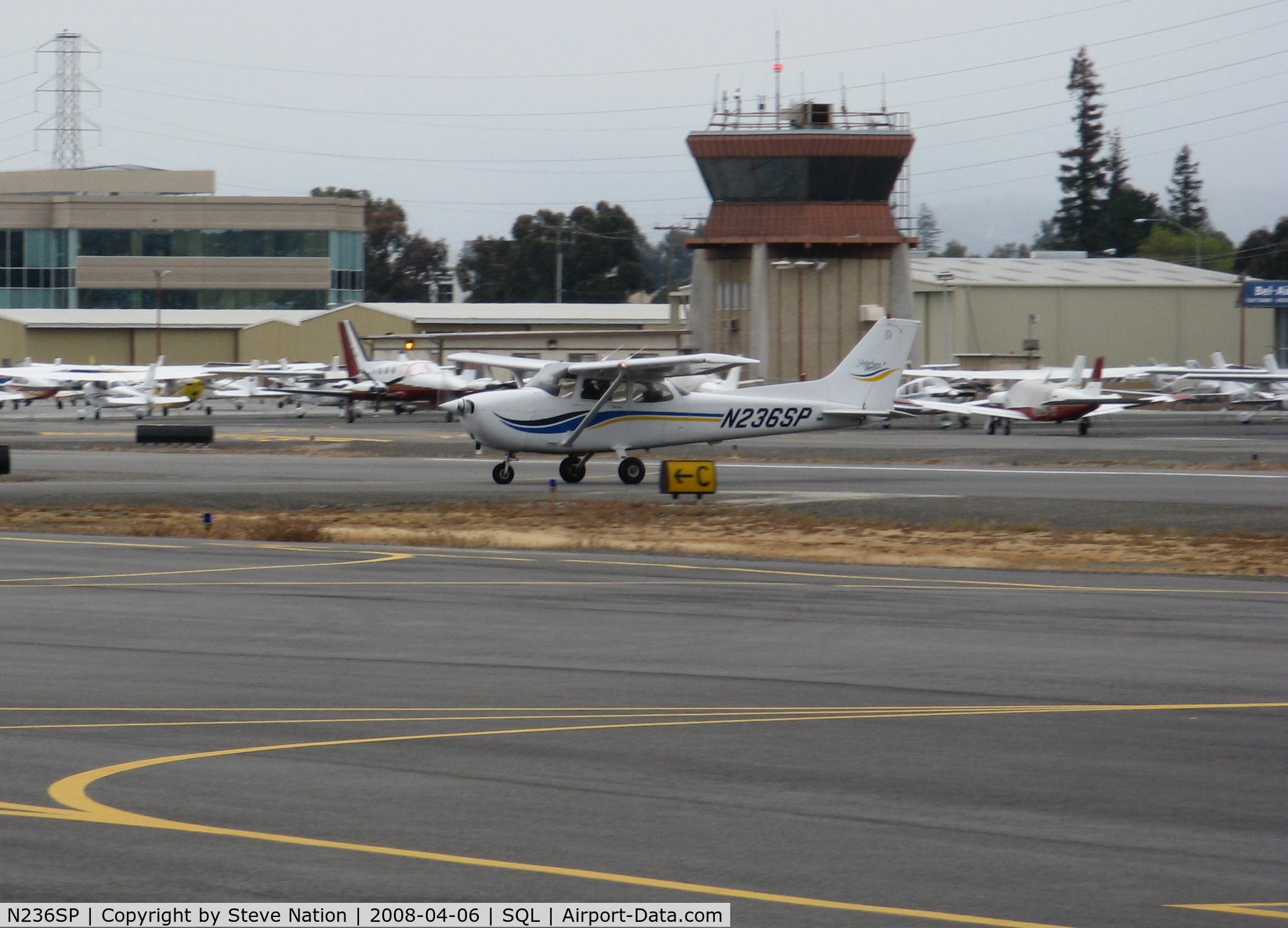 N236SP, 1999 Cessna 172S C/N 172S8213, 1999 Cessna 172S taxying across active runway @ San Carlos, CA