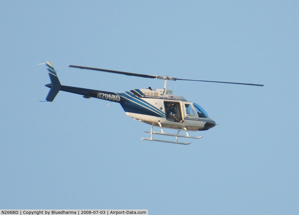 N206BD, 1992 Bell 206B JetRanger III C/N 4203, Not sure what he was doing. Looks like he was taking pictures at Columbine High School.