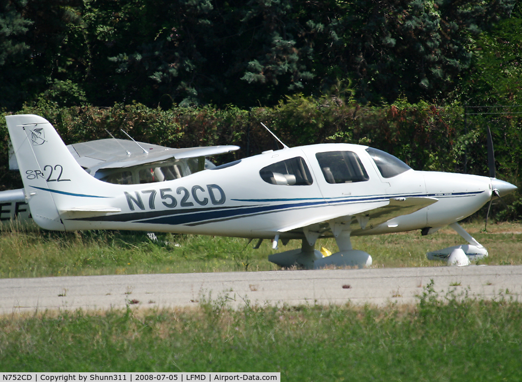 N752CD, 2001 Cirrus SR22 C/N 0052, Parked in the grass...