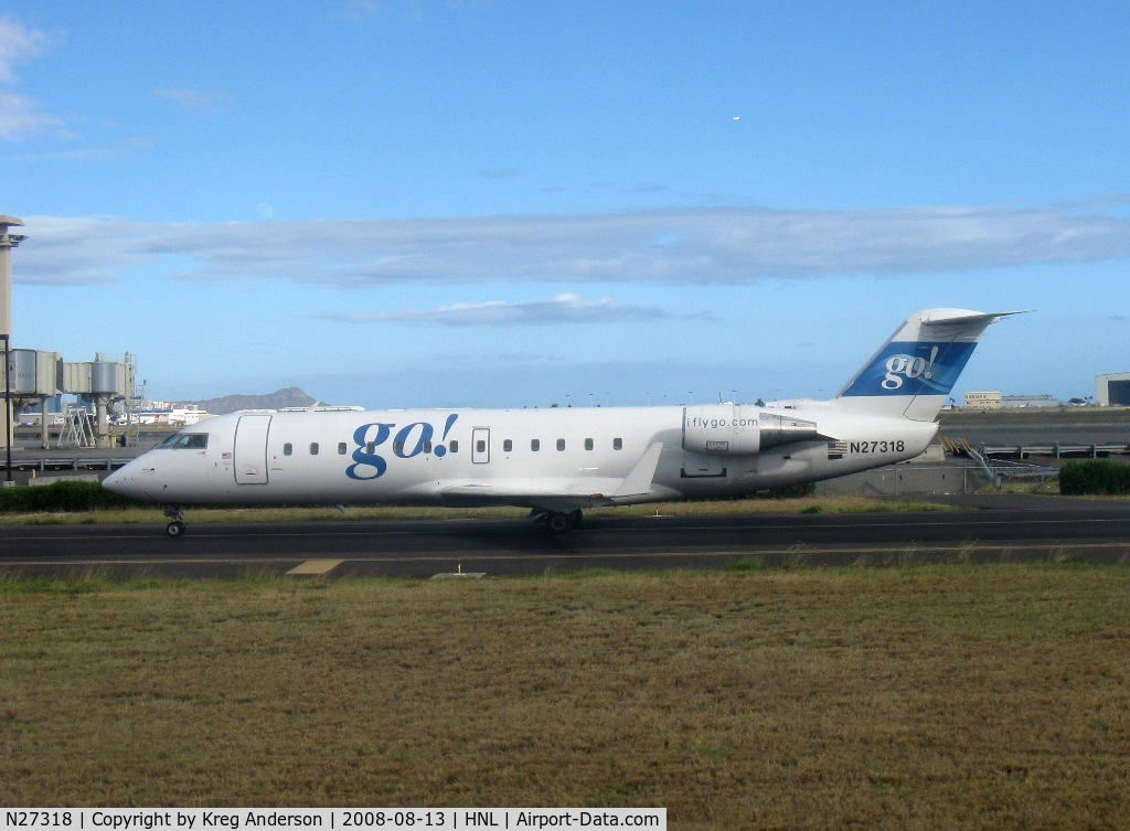 N27318, 1999 Bombardier CRJ-200LR (CL-600-2B19) C/N 7318, Passing it on the taxiway