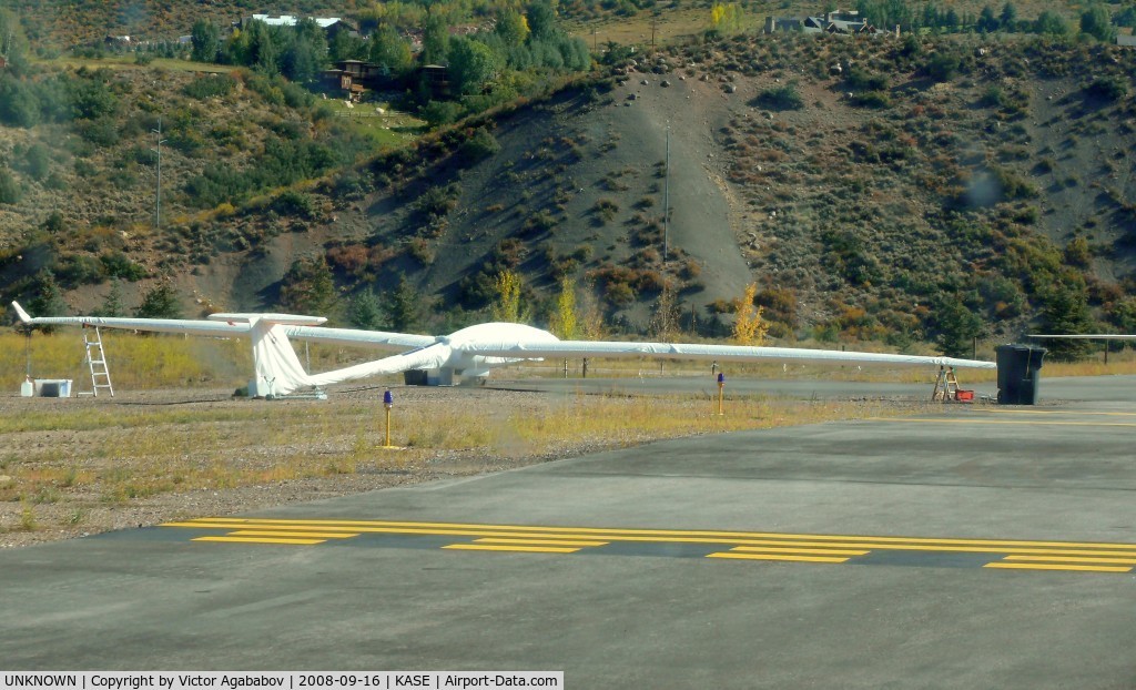 UNKNOWN, Gliders Various C/N unknown, Glider lying at the end of taxiway A at Aspen.