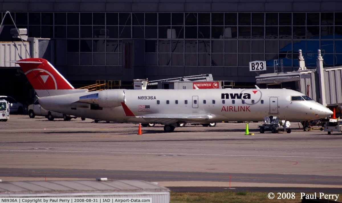 N8936A, 2004 Bombardier CRJ-200 (CL-600-2B19) C/N 7936, With the right lighting, looks like a pearl white color as their base