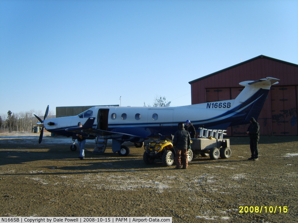 N166SB, 1999 Pilatus PC-12/45 C/N 310, Loading plane in Ambler, Alaska for return to Fairbanks.