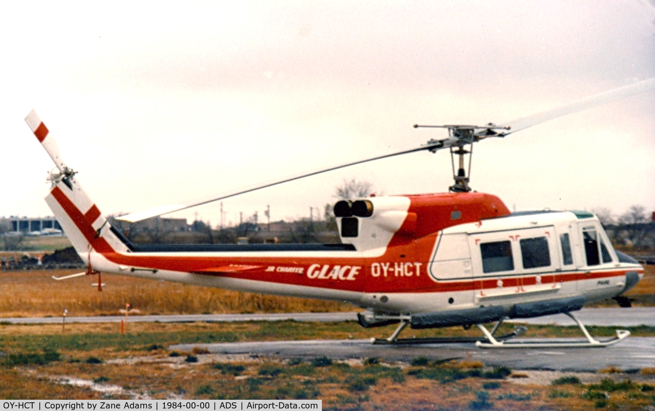 OY-HCT, Bell 212 Twin Huey C/N 31154, At Dallas Addison