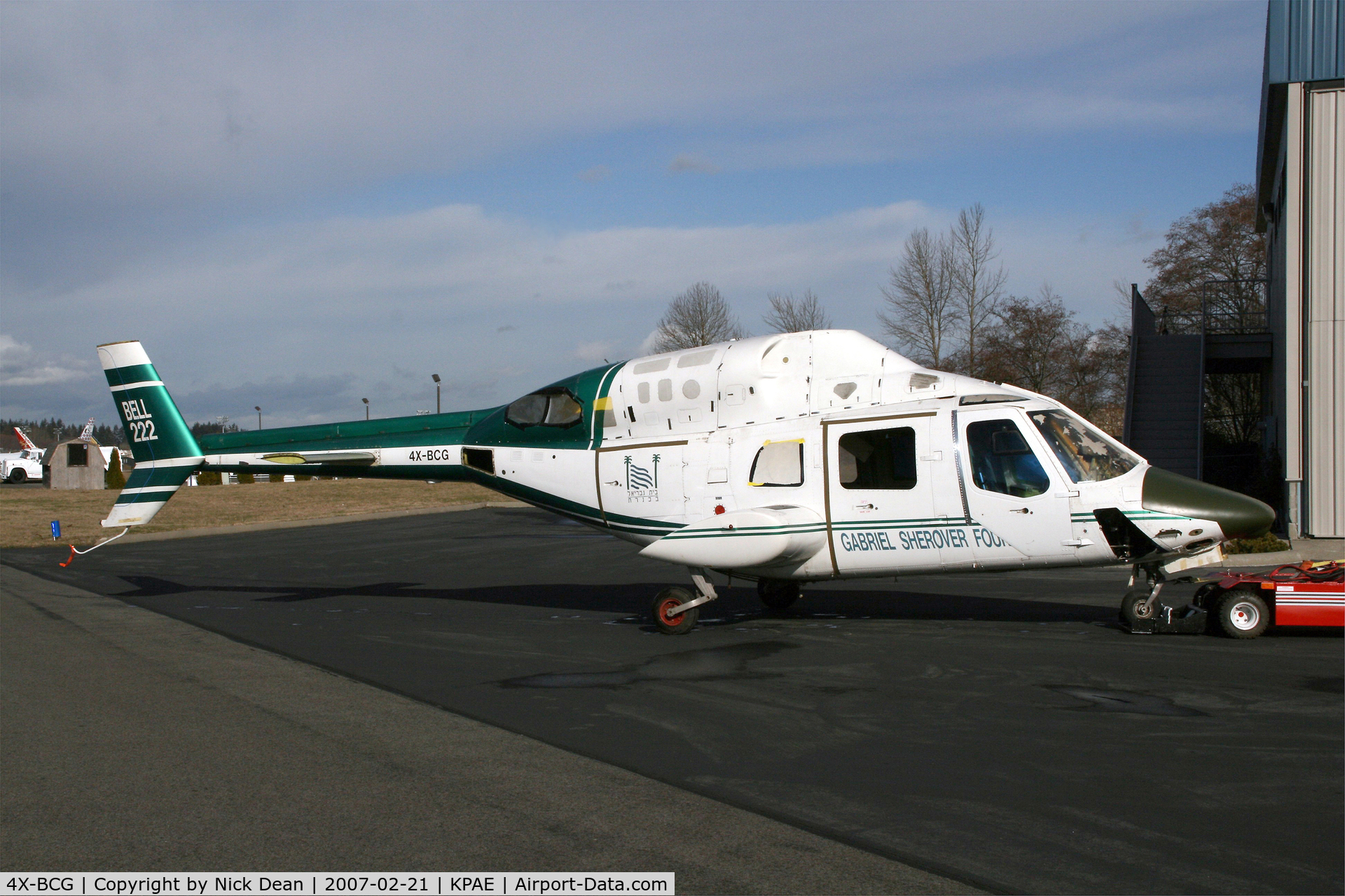 4X-BCG, Bell 222 C/N 47047, We still have this at PAE in a friends hangar awaiting its final demize