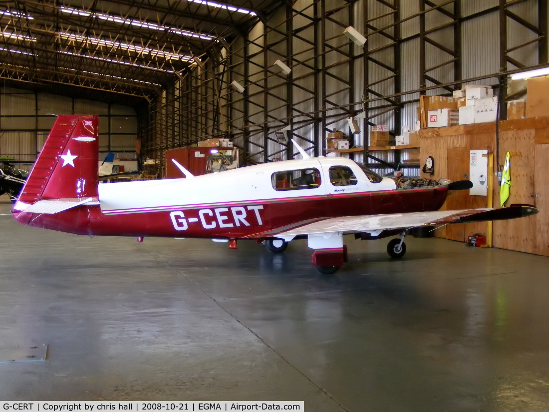 G-CERT, 1987 Mooney M20K C/N 25-1134, inside the hangar at Fowlmere