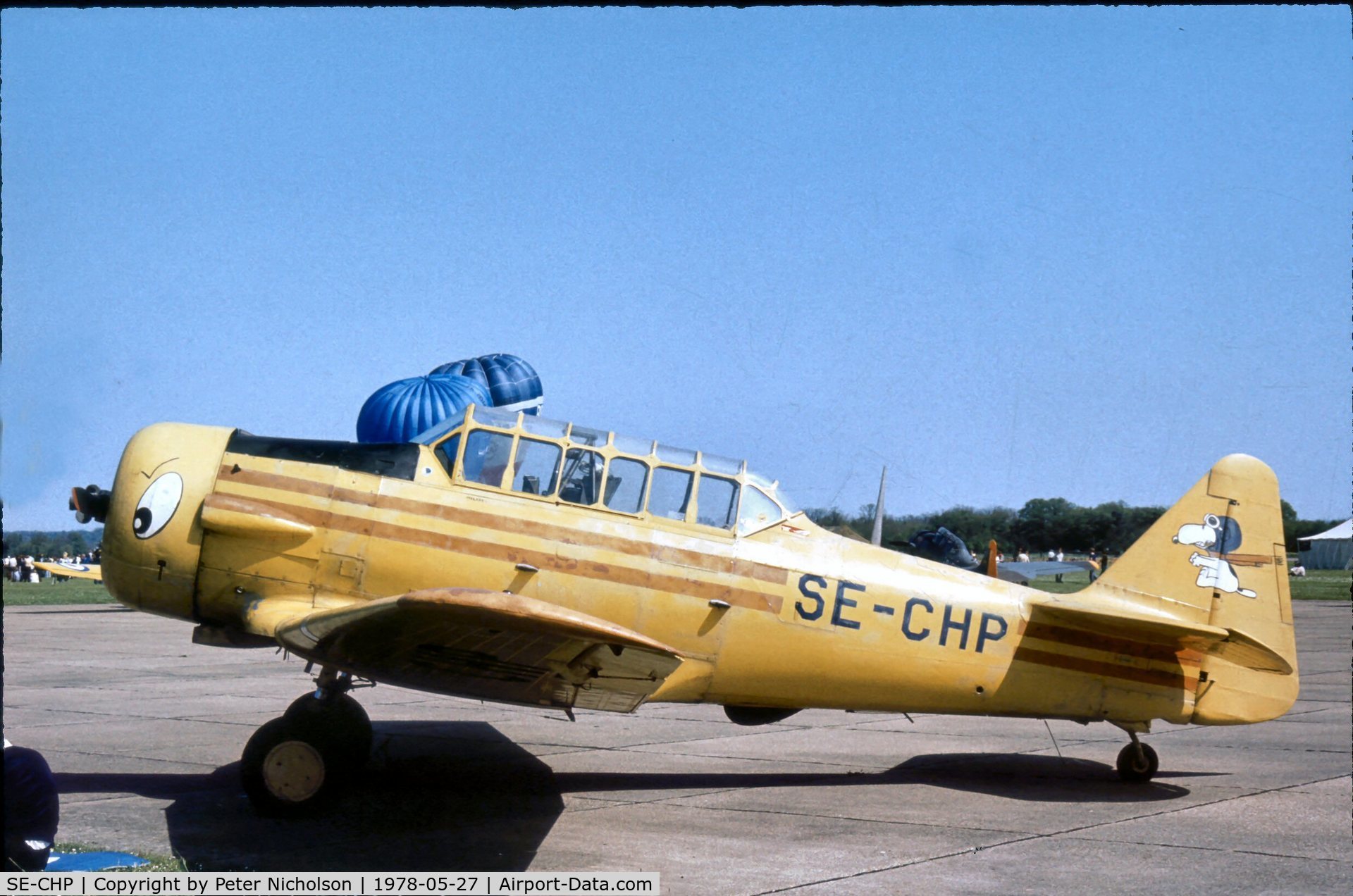 SE-CHP, 1941 North American AT-6A Texan C/N 78-6821, Texan ex Swedish AF 16269 in an earlier Snoopy colour scheme visiting Bassingbourn Air Show in 1978