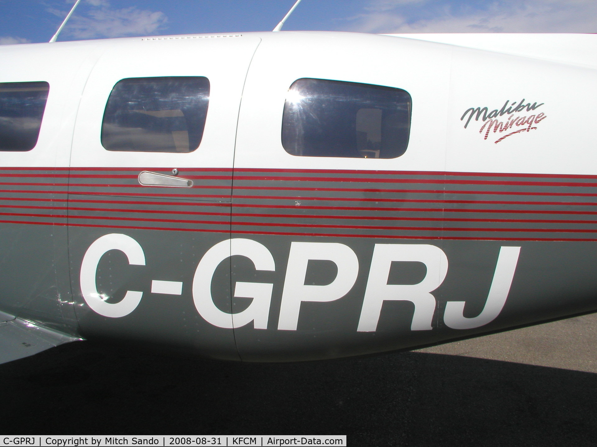 C-GPRJ, 1989 Piper PA-46-350P Malibu Mirage C/N 4622069, Parked on the ramp at ASI Jet Center.