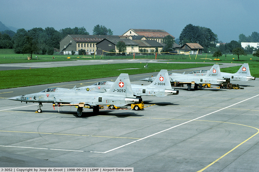 J-3052, Northrop F-5E Tiger II C/N L.1052, During the annual refresher course these Tigers are waiting for yet another mission. In the background the usual net barrier. It was not until the arrival of the Hornet that Switzerland introduced arrester cables.