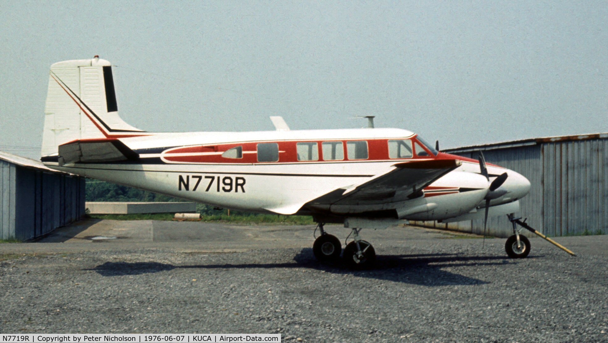 N7719R, 1965 Beech 65 C/N LC-190, This Twin Bonanza was seen at Oneida County Airport, New York State in 1976 - airport later closed in 2007.