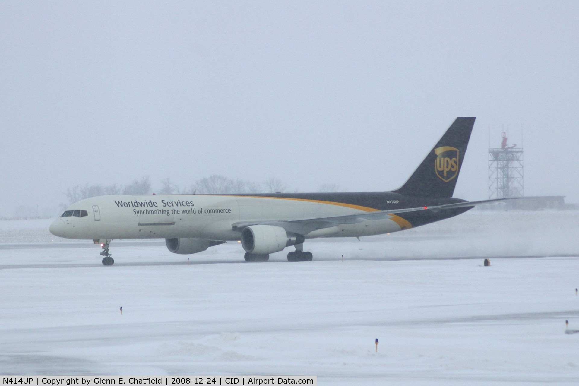 N414UP, 1988 Boeing 757-24APF C/N 23854, Taxiing to cargo ramp via Alpha.  Early morning in the snow.