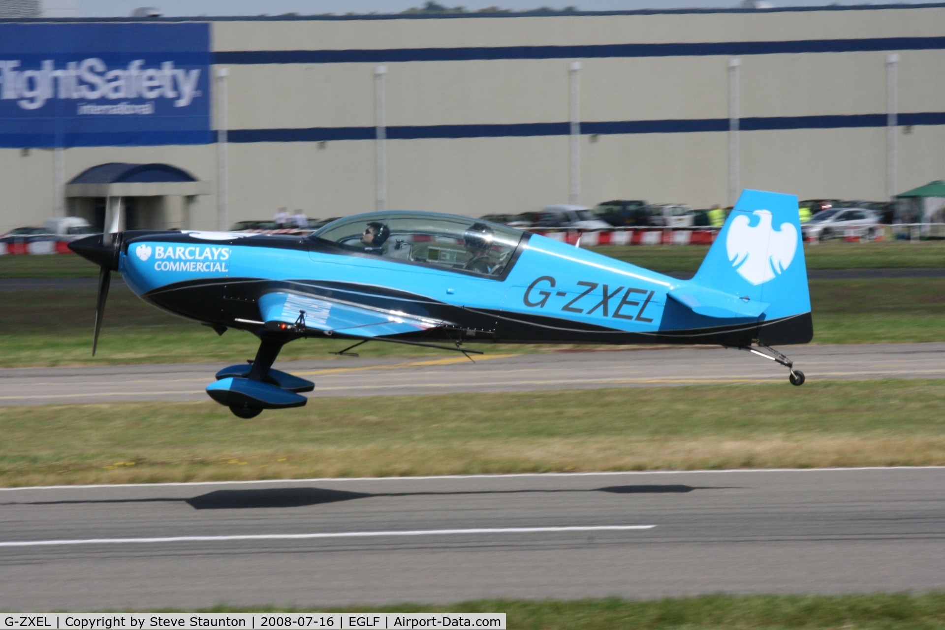 G-ZXEL, 2006 Extra EA-300L C/N 1224, Taken at Farnborough Airshow on the Wednesday trade day, 16th July 2009