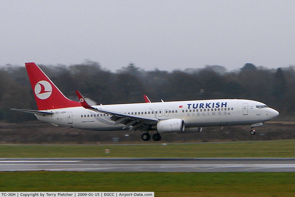 TC-JGH, 2006 Boeing 737-8F2 C/N 34406, THY Boeing 737-400 touches down on a typically gloomy Manchester day