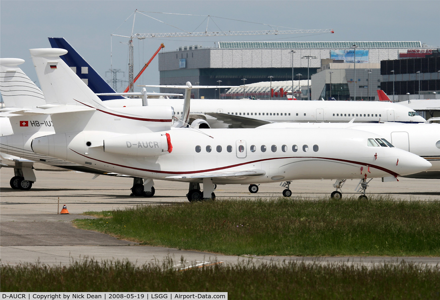 D-AUCR, Dassault Falcon 900DX C/N 606, LSGG (The usual gaggle of biz present during EBACE)