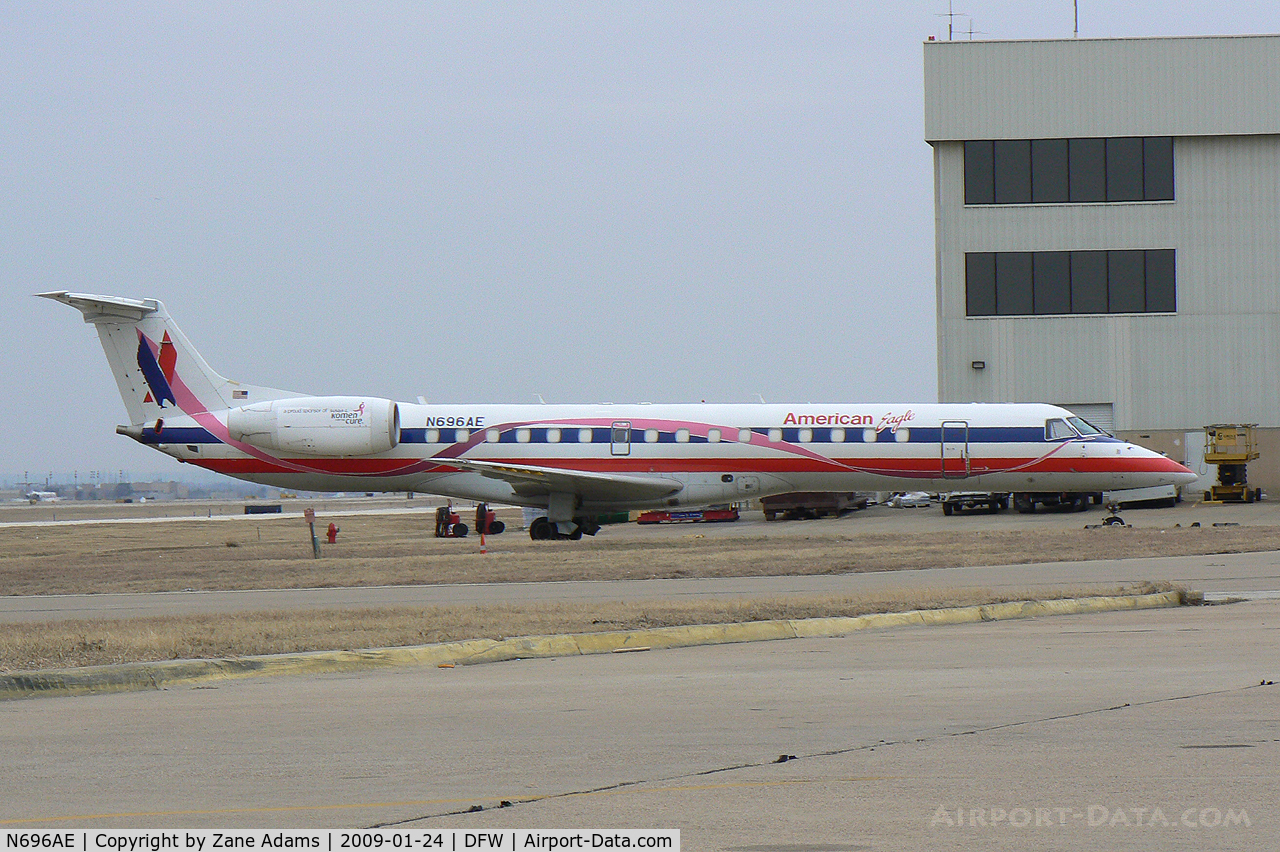 N696AE, 2004 Embraer ERJ-145LR (EMB-145LR) C/N 14500874, American Eagle at DFW - Special Paint - Susan G. Komen Race for the Cure