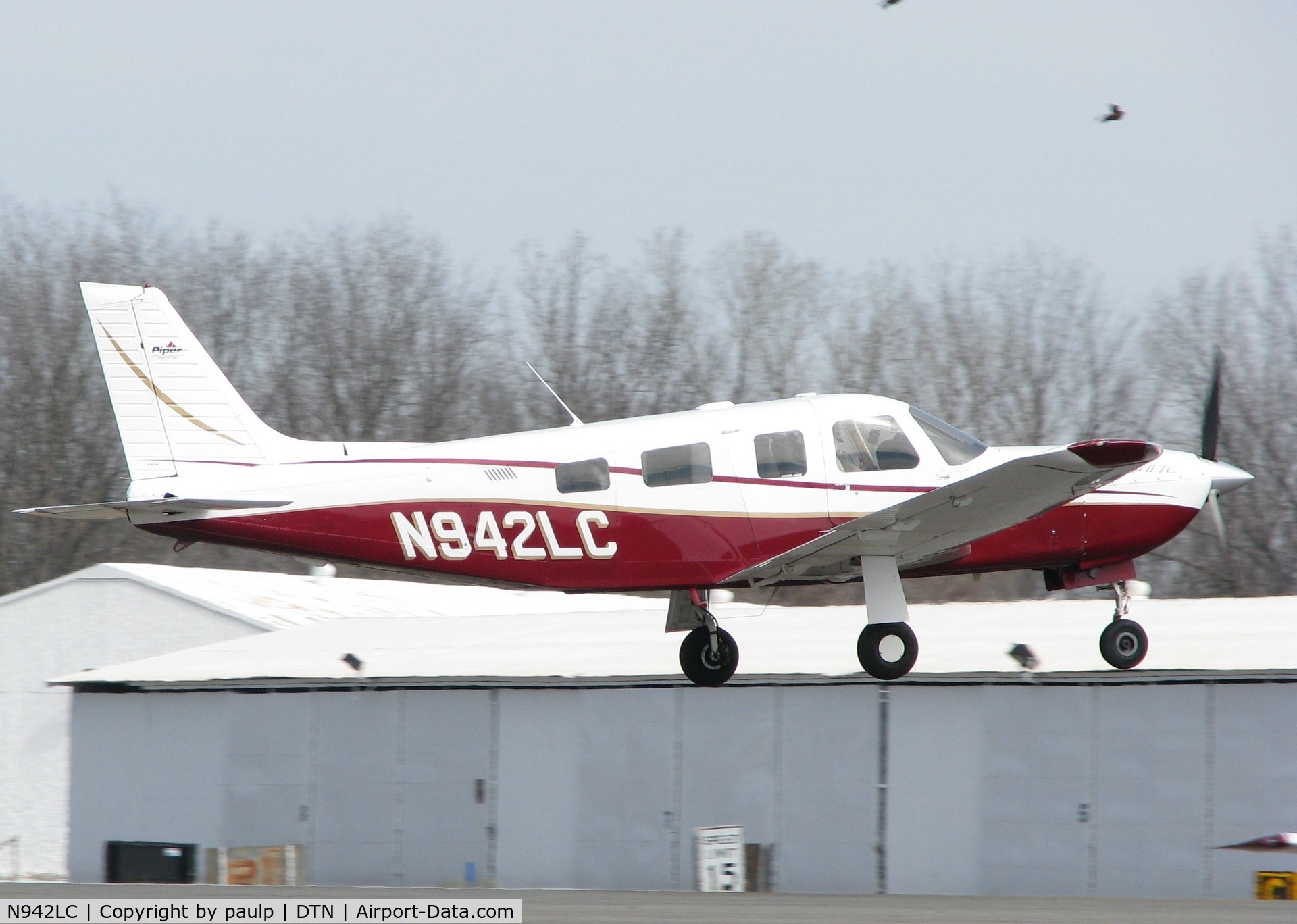 N942LC, 2001 Piper PA-32R-301T Turbo Saratoga C/N 3257265, Touching down at Downtown Shreveport.