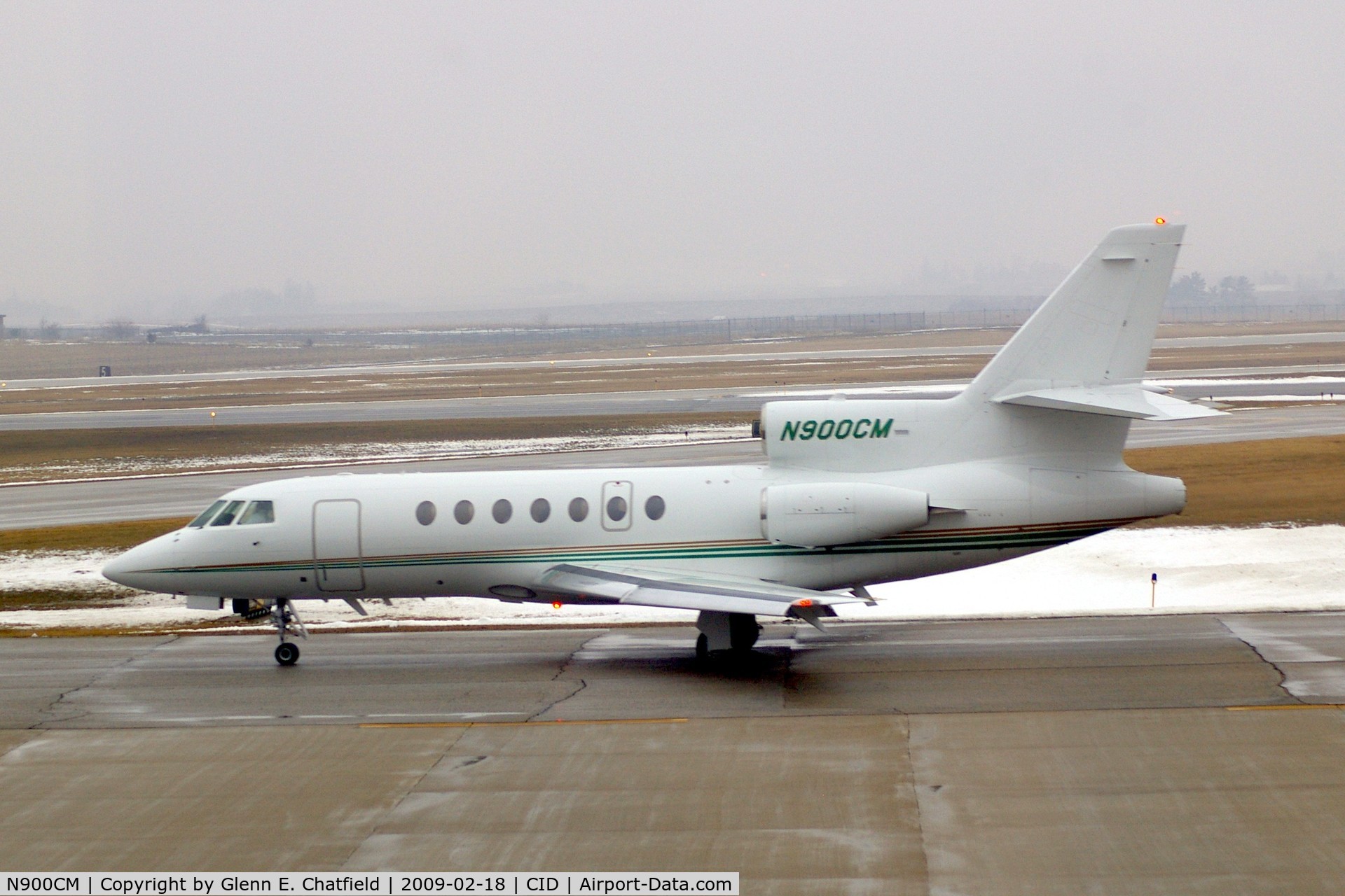 N900CM, 2002 Dassault Mystere Falcon 50 C/N 321, Taxiing from Landmark to Runway 27 for departure, in drizzle