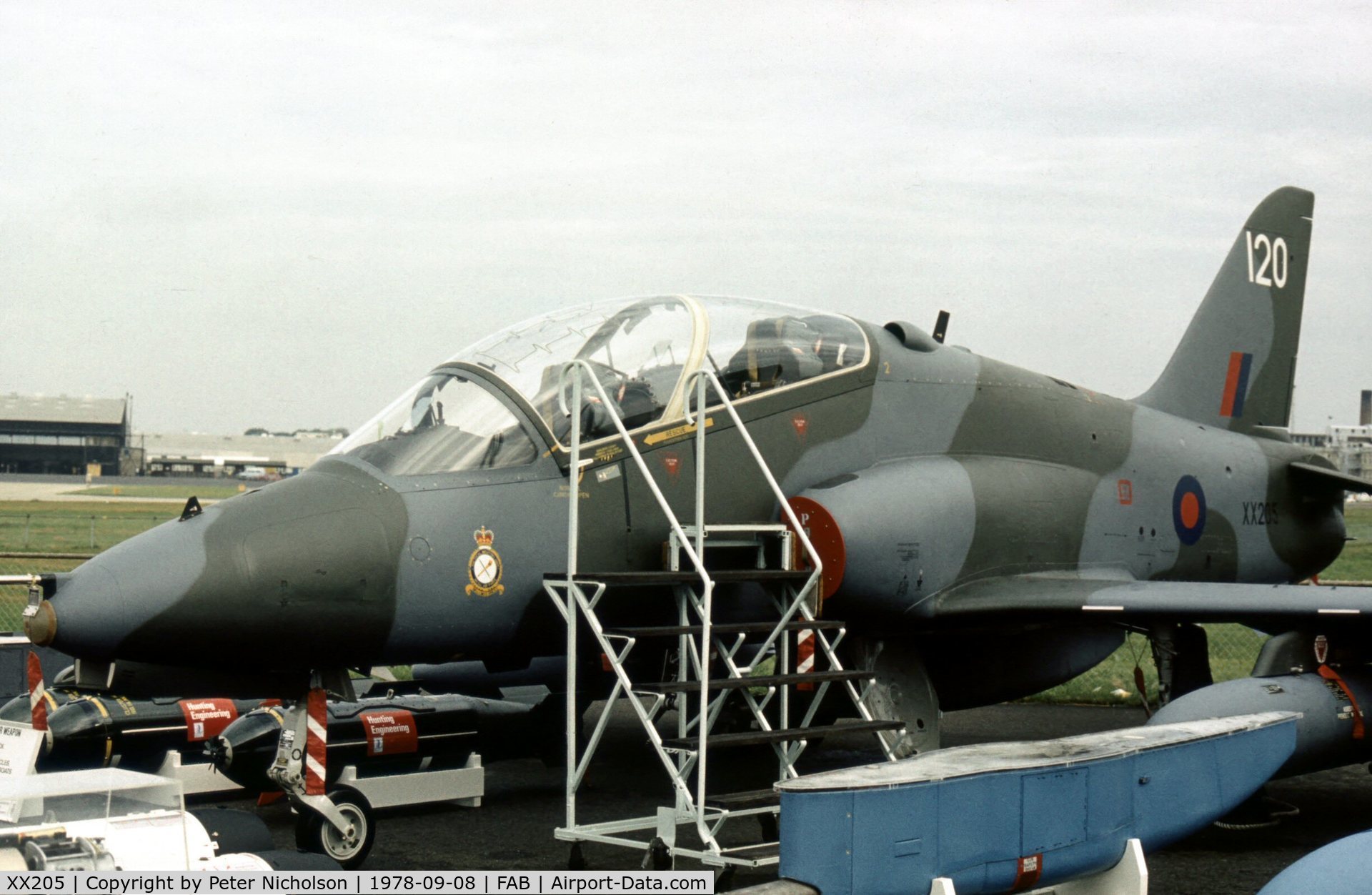 XX205, 1978 Hawker Siddeley Hawk T.1 C/N 052/312052, Mixed weapons load around this Tactical Weapons Unit Hawk T.1 as displayed at the 1978 Farnborough Air Show.