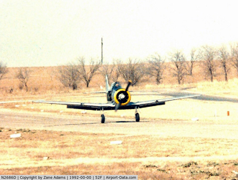 N2686D, 1944 North American SNJ-5 Texan Texan C/N 121-41987, Landing at North West Regional (Aero Valley) after loosing a side panel during flight.