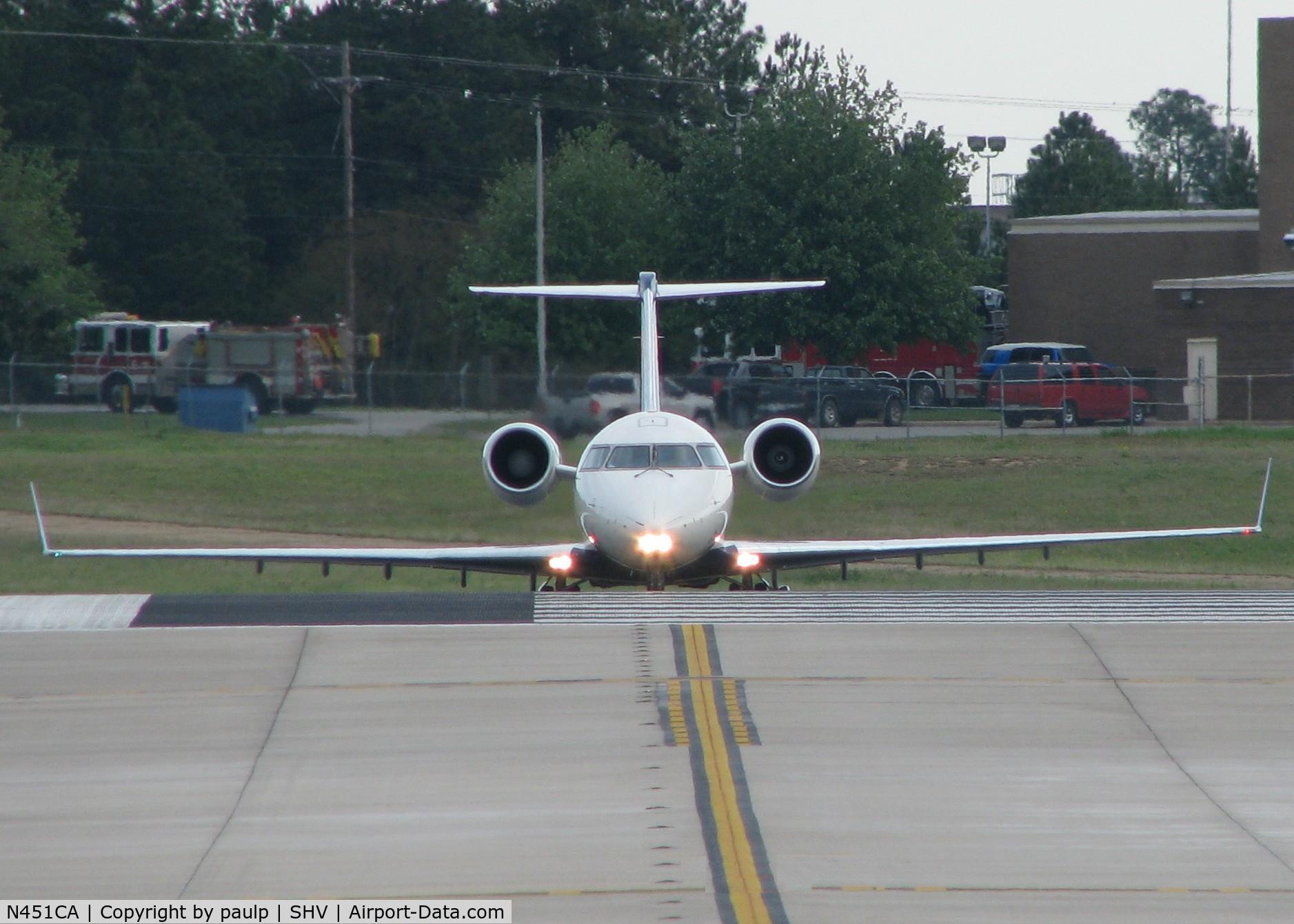 N451CA, 2001 Bombardier CRJ-200ER (CL-600-2B19) C/N 7562, Holding short of 14 waiting on landing traffic.