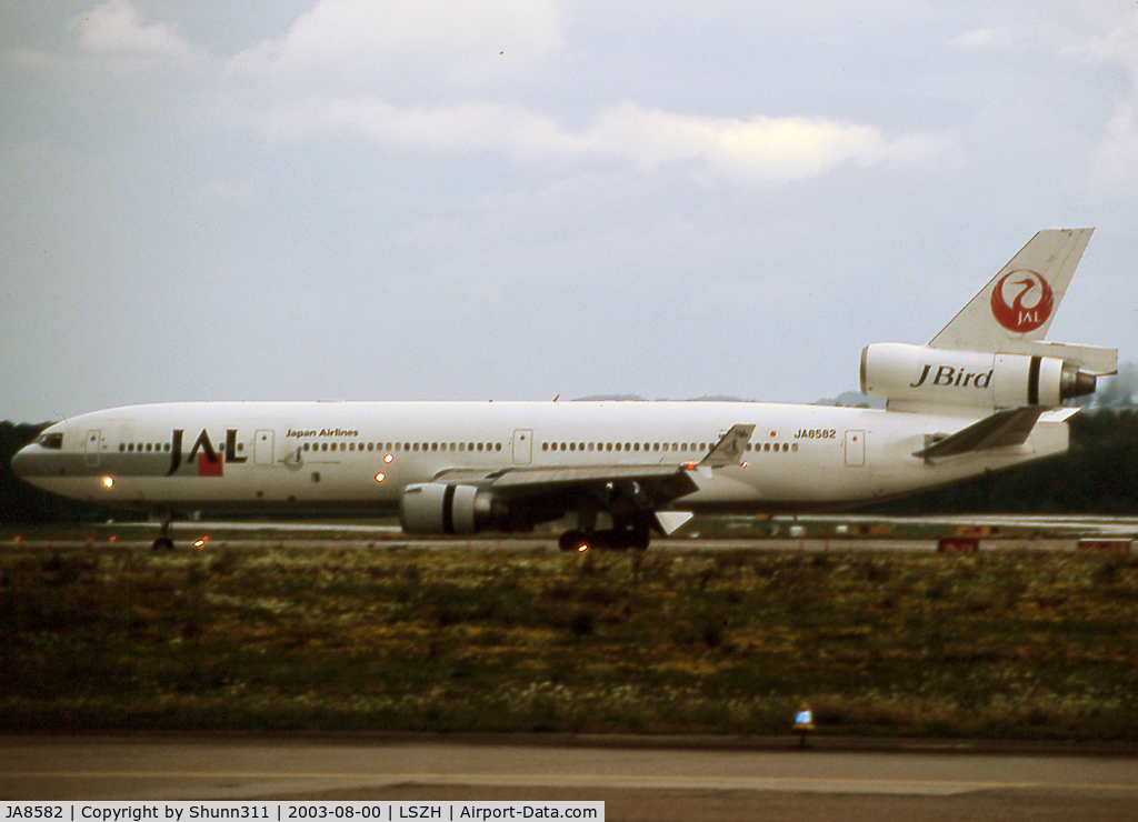 JA8582, 1994 McDonnell Douglas MD-11 C/N 48573, Taxiing holding point rwy 16 for departure