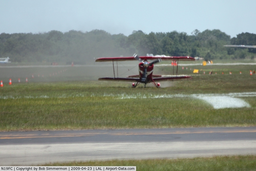 N19FC, 1999 Aviat Pitts S-2C Special C/N 6027, Landing on the grass at Sun N Fun 2009 - Lakeland, Florida