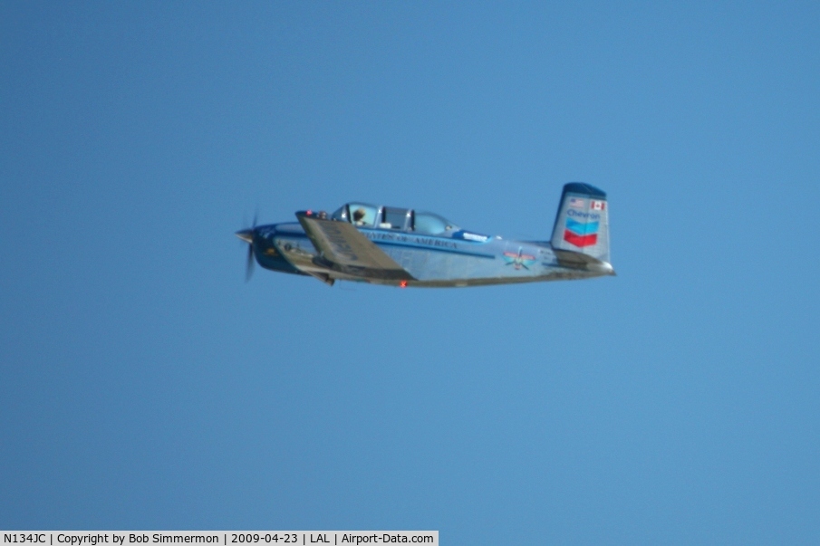 N134JC, 1955 Beech T-34-A (A45) Mentor C/N G-812, Aerobatic star Julie Clarke departing Sun N Fun 2009 - Lakeland, Florida