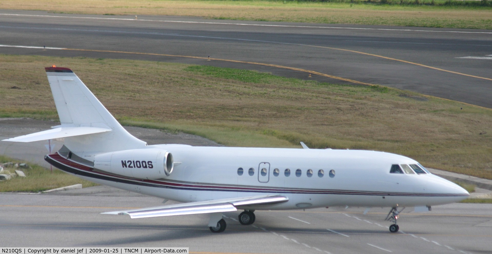N210QS, 2003 Dassault Falcon 2000 C/N 211, taxing runway 10