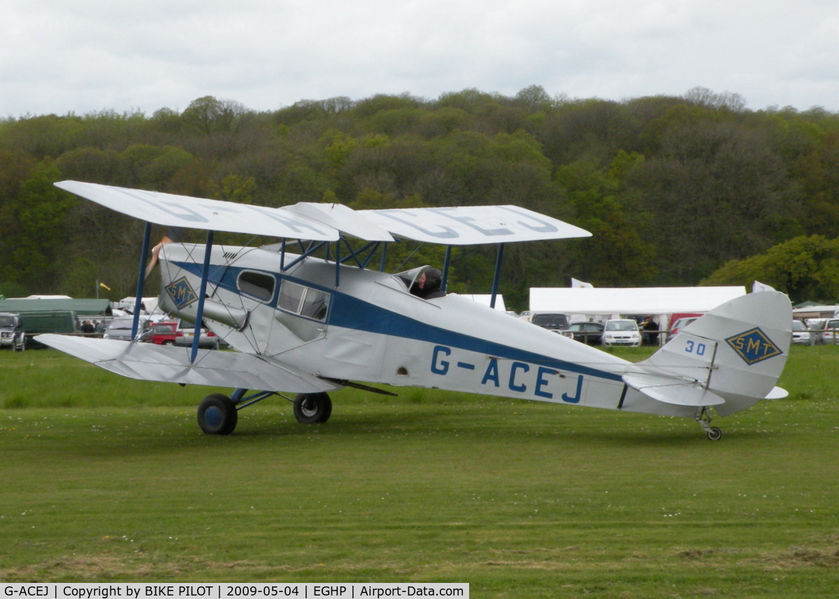 G-ACEJ, 1933 De Havilland DH.83 Fox Moth C/N 4069, GREAT LOOKING FOX MOTH TAXYING TOWARDS THE CLUB HOUSE