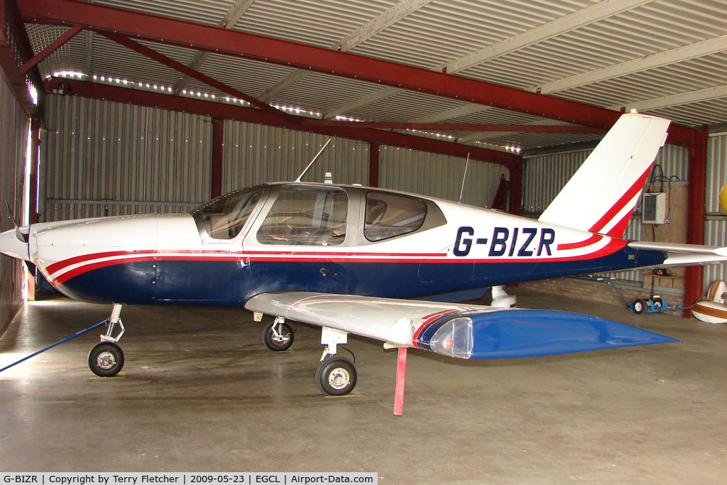 G-BIZR, 1981 Socata TB-9 Tampico C/N 210, Socata TB-9 hangared at 2009 May Fly-in at Fenland