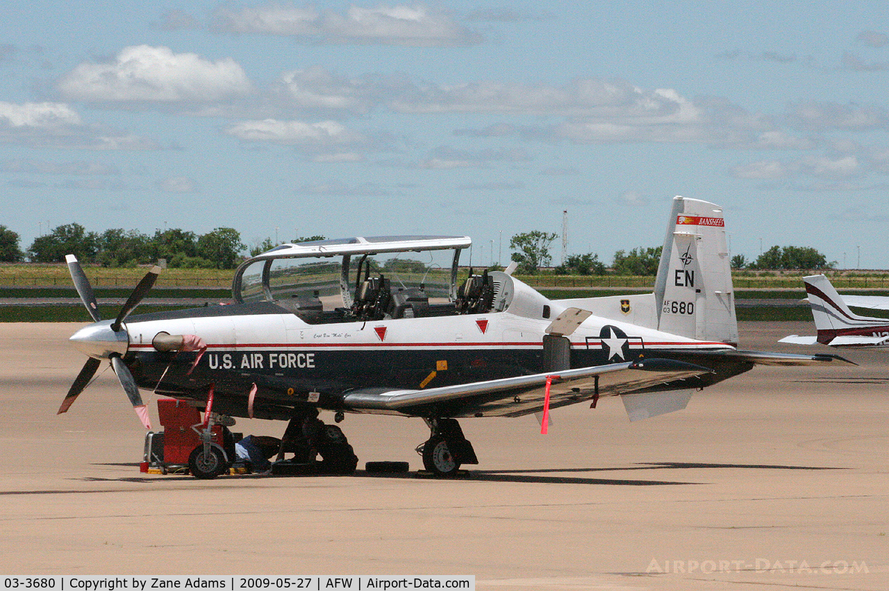 03-3680, 2003 Raytheon T-6A Texan II C/N PT-226, At Alliance, Fort Worth - Local maintenance crew making repairs on the ramp