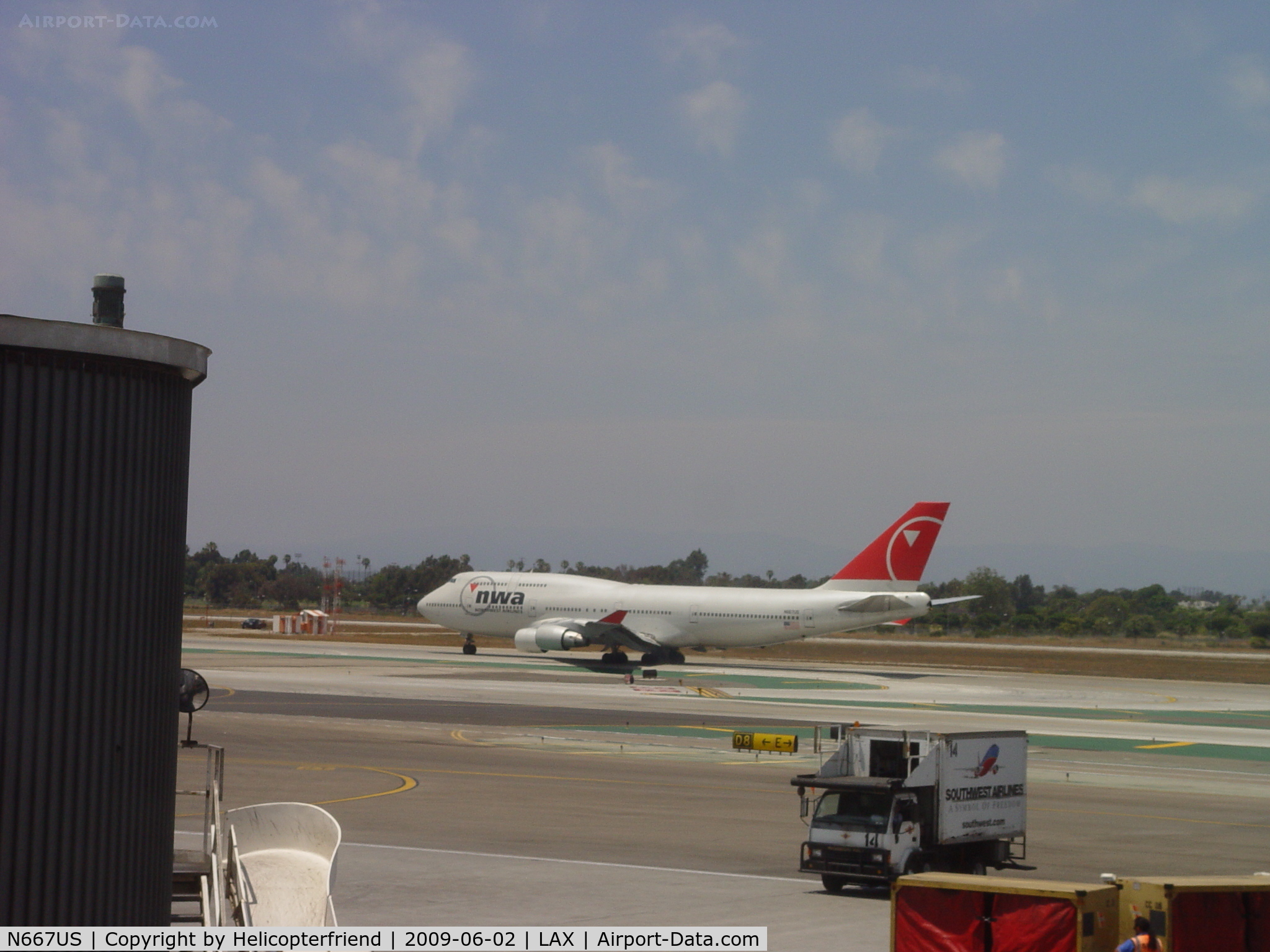 N667US, 1990 Boeing 747-451 C/N 24222, Starting take off roll westbound on 24L