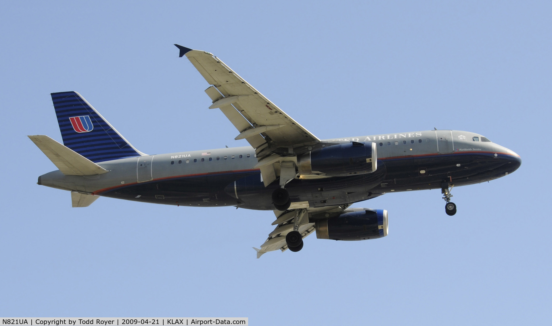 N821UA, 1998 Airbus A319-131 C/N 944, Landing 24R at LAX