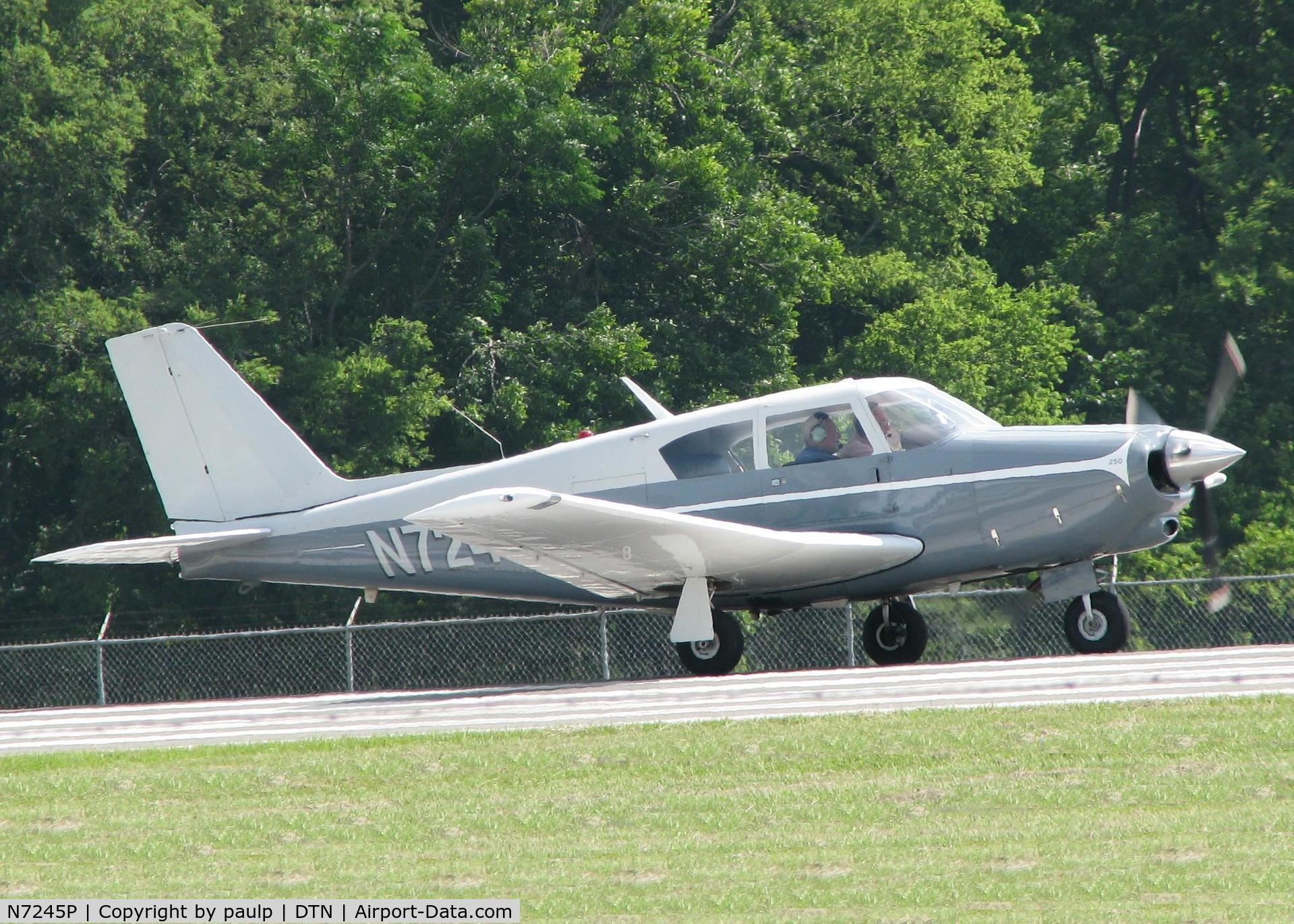 N7245P, 1960 Piper PA-24-250 Comanche C/N 24-2419, Starting to roll for take off on runway 14 at the Shreveport Downtown airport.