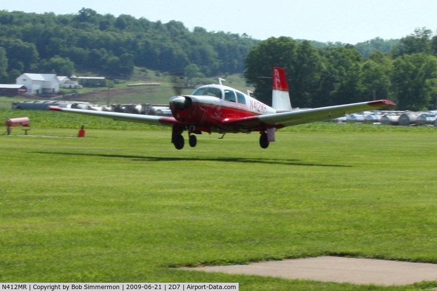 N412MR, 1968 Mooney M20C Ranger C/N 680163, Landing on 28 at the Beach City, Ohio Father's Day fly-in.