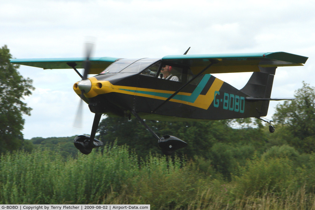G-BDBD, 1963 Wittman W-8 Tailwind C/N 133, Wittman Tailwind hedge-hopping into  the 2009 Stoke Golding Stakeout event