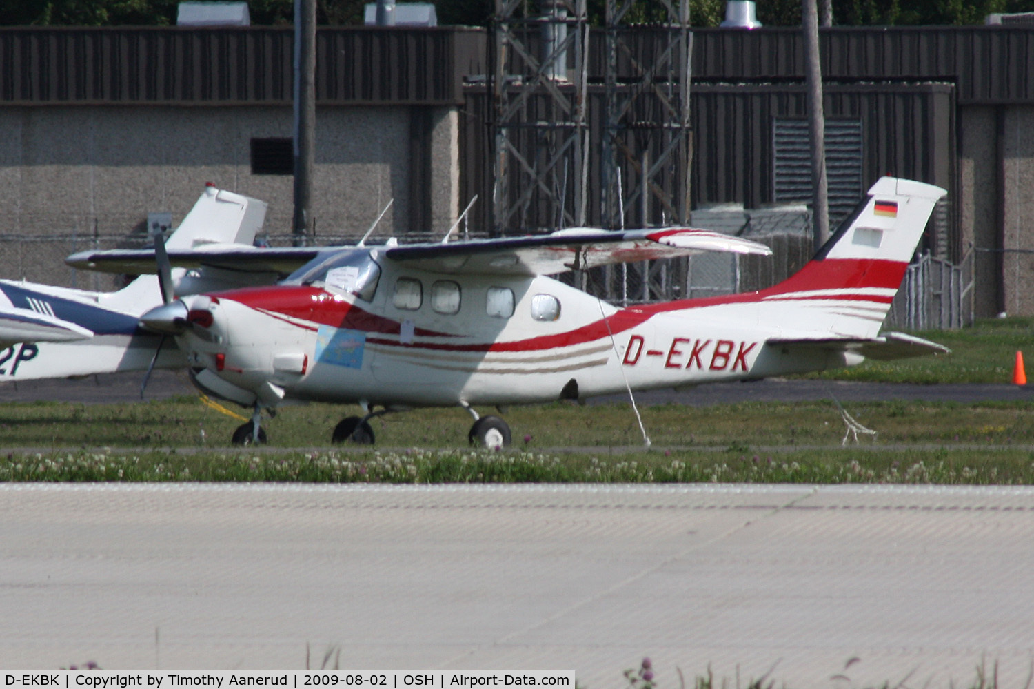 D-EKBK, Cessna P210N Pressurised Centurion C/N P21000661, Cessna P210N, c/n: P21000661, saw this P210 parked across RWY 9-27.  Germany to Oshkosh!