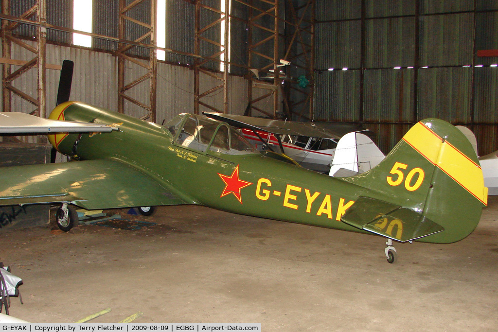 G-EYAK, 1980 Yakovlev Yak-50 C/N 801804, Yak 50 hangared at Leicester
