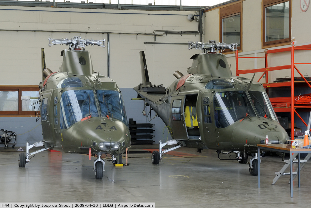 H44, Agusta A-109BA C/N 0344, H44 and H07 are semi dismanteled in the hangar awaiting their fate.