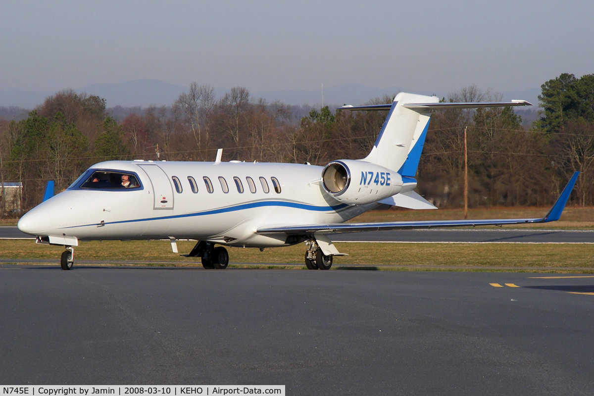 N745E, 2007 Learjet Inc 45 C/N 348, Taxiing up the ramp after an early morning arrival.