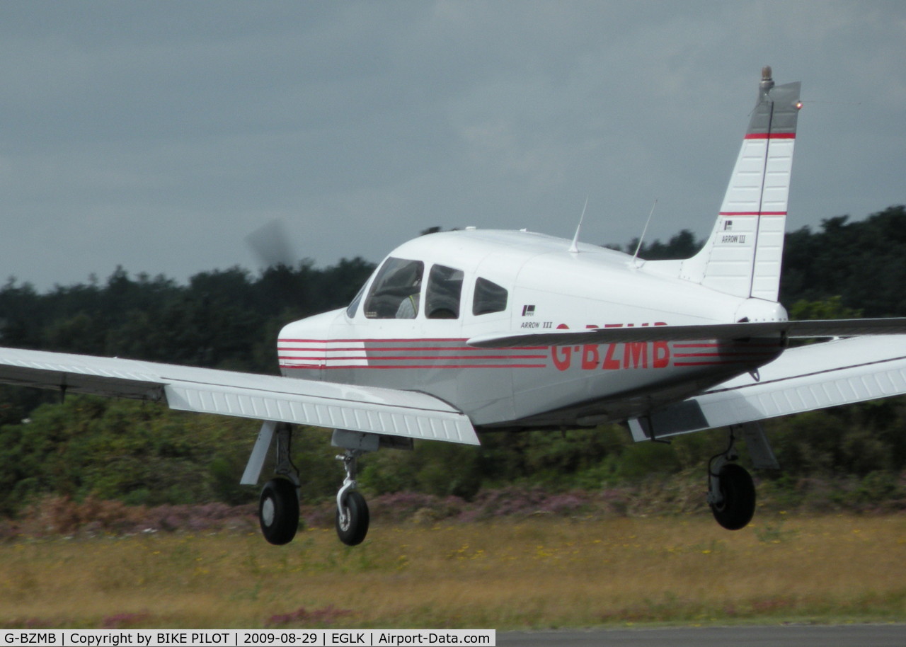 G-BZMB, 1978 Piper PA-28R-201 Cherokee Arrow III C/N 28R-7837144, ABOUT TO TOUCH DOWN RWY 25