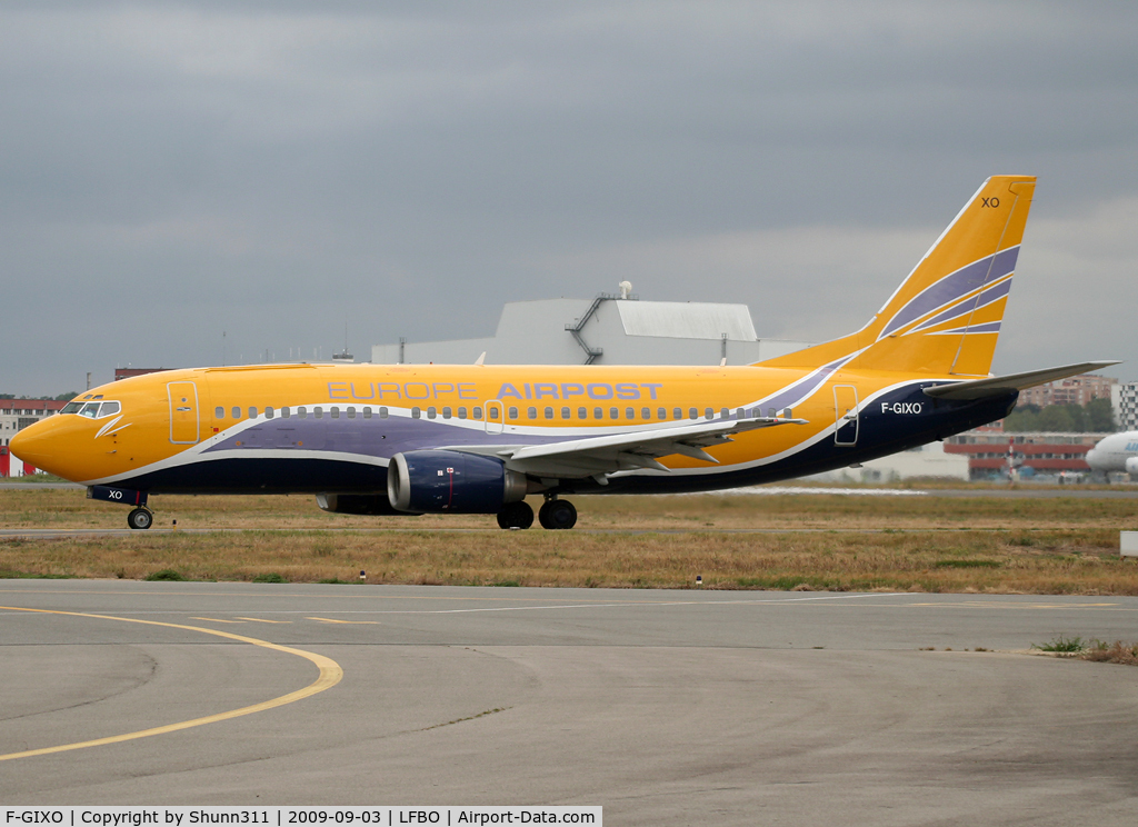 F-GIXO, 1988 Boeing 737-3Q8CF C/N 24132, Taxiing holding point rwy 32R for departure in new c/s