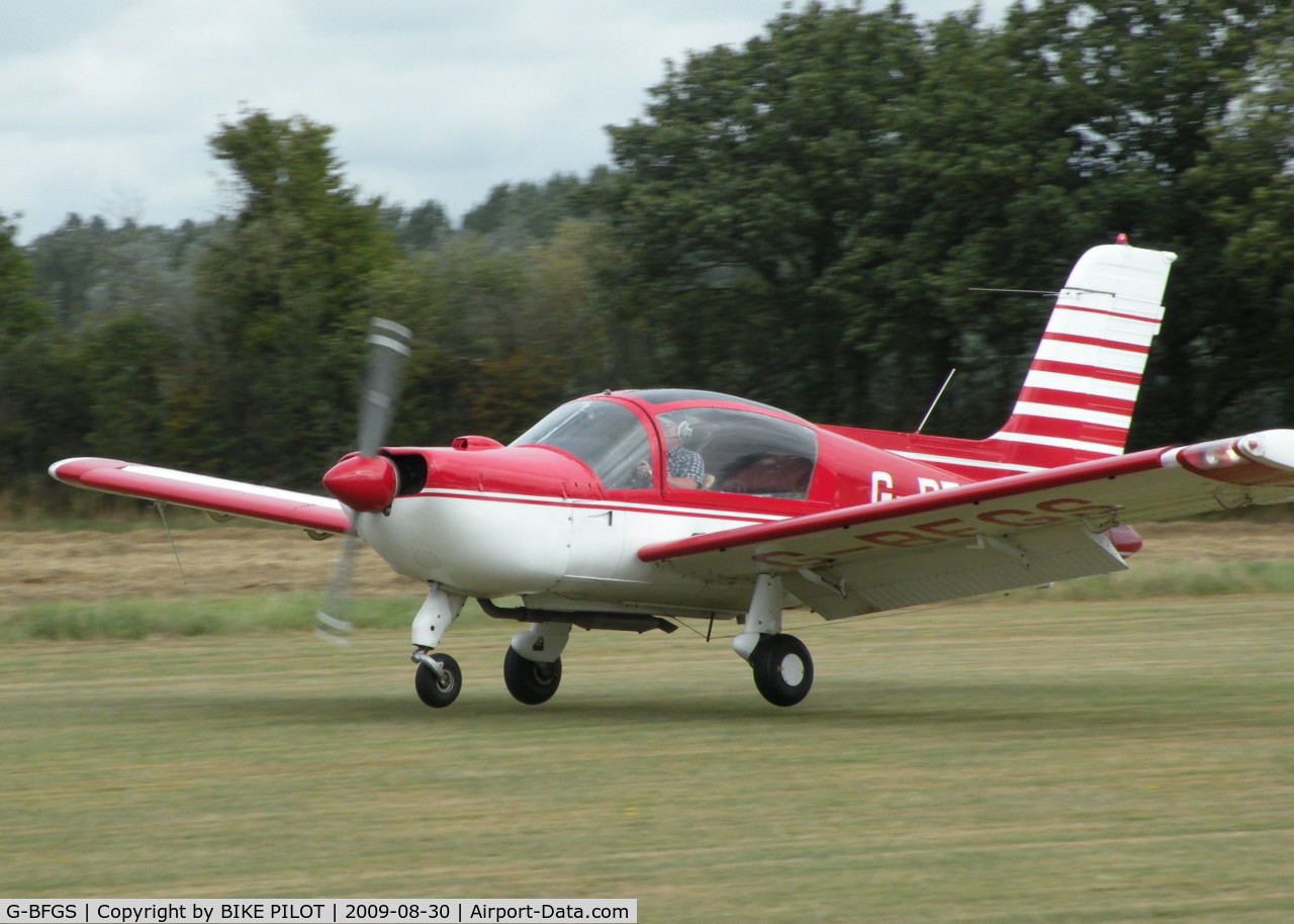 G-BFGS, 1975 Socata MS-893E Rallye 180GT Gaillard C/N 12571, JUST ABOUT TO TOUCH DOWN ON RWY 25. PREV. REG. F-BXYK. BRIMPTON FLY-IN