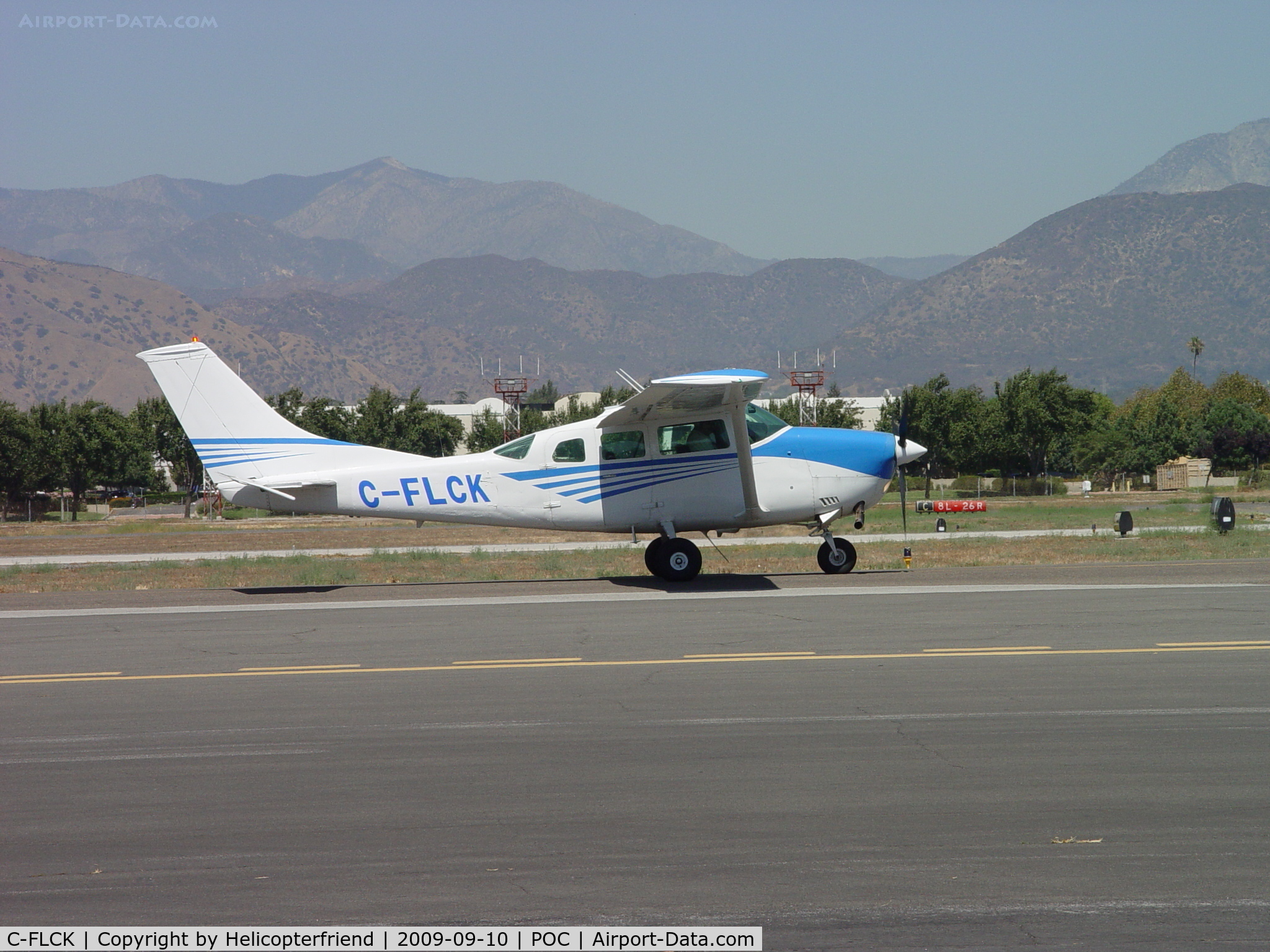 C-FLCK, 1972 Cessna TU206F Turbo Stationair C/N U20601746, Taxiing east for take off