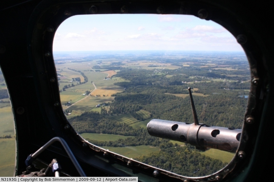 N3193G, 1944 Boeing B-17G Flying Fortress C/N 77255, View out the right side window at Yankee Lady's bombardier space over western Ohio at 2500'.