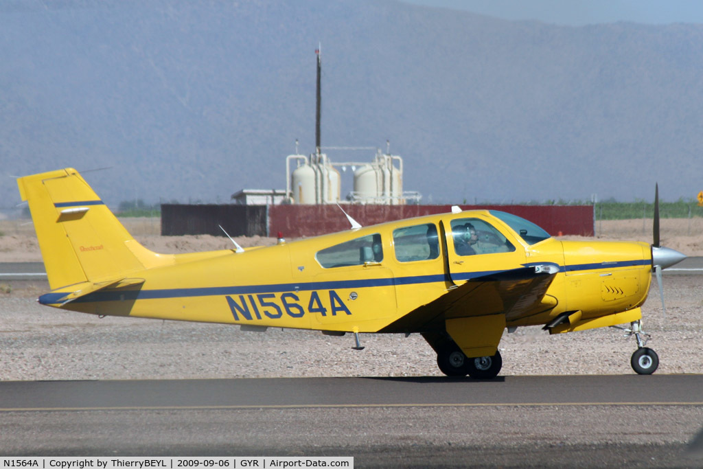 N1564A, 1989 Beech F33A Bonanza C/N CE-1321, Taxying at Phoenix Goodyear Airport