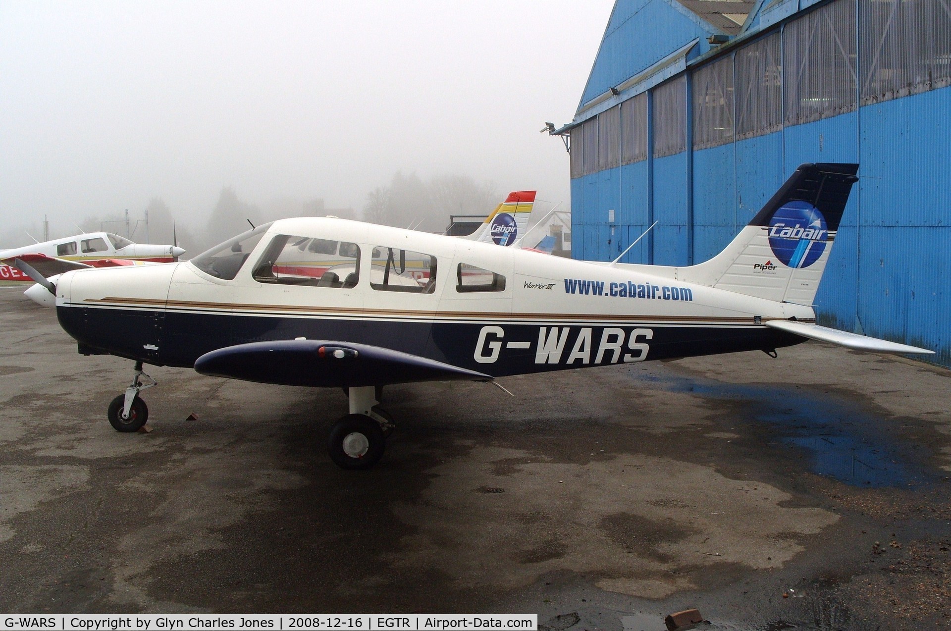 G-WARS, 1997 Piper PA-28-161 Cherokee Warrior III C/N 2842022, Taken on a quiet cold and foggy day. With thanks to Elstree control tower who granted me authority to take photographs on the aerodrome. Previously N9281X. Operated by Cabair.