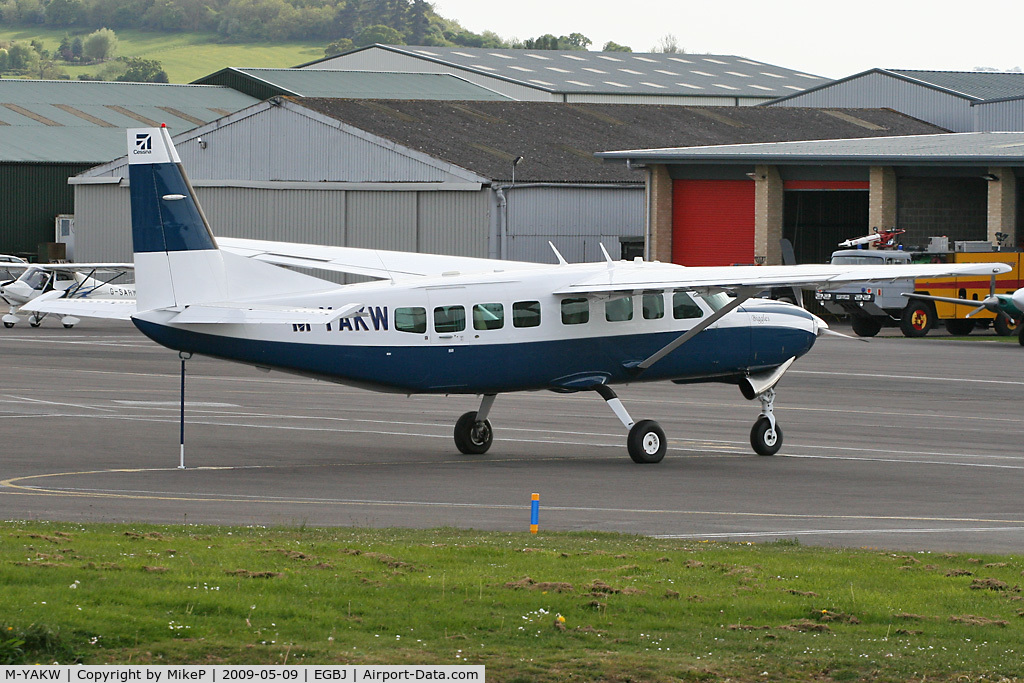 M-YAKW, 2004 Cessna 208B Grand Caravan C/N 208B-1059, Just arrived and parked on the terminal ramp.